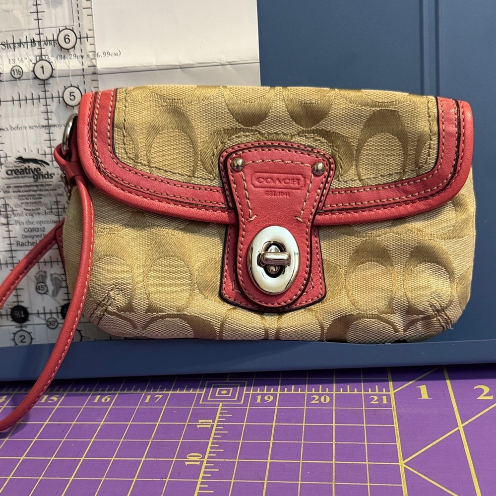 Coach Legacy Signature Cs Tan and Pink Wristlet